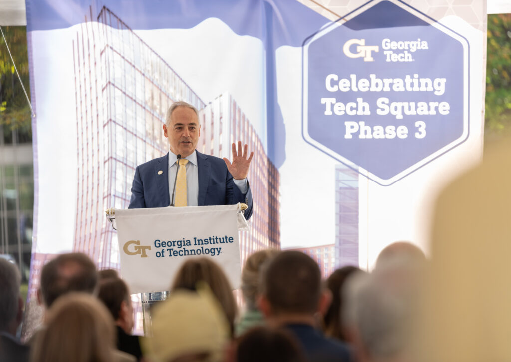 Angel Cabrera standing at podium making a speech at Georgia Tech