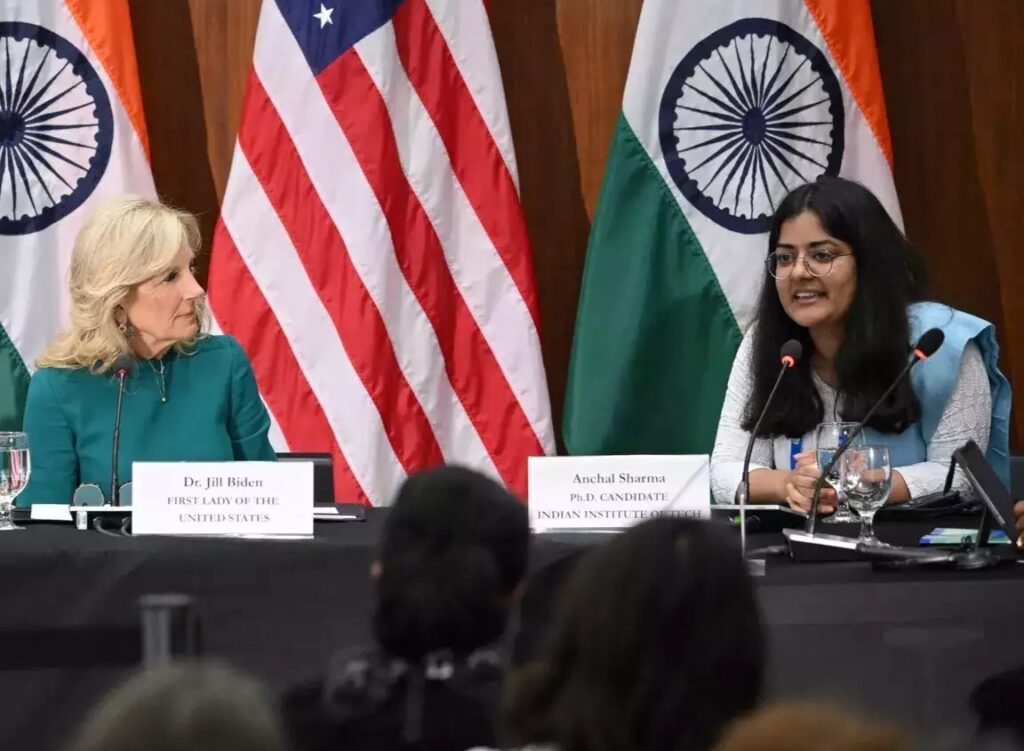 Anchal Sharma presenting research along side First Lady Dr. Biden