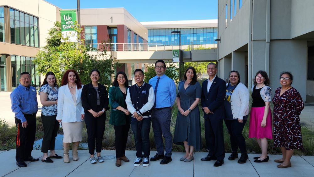 Charles Sasaki standing with Scholar Liaisons at Ohlone College